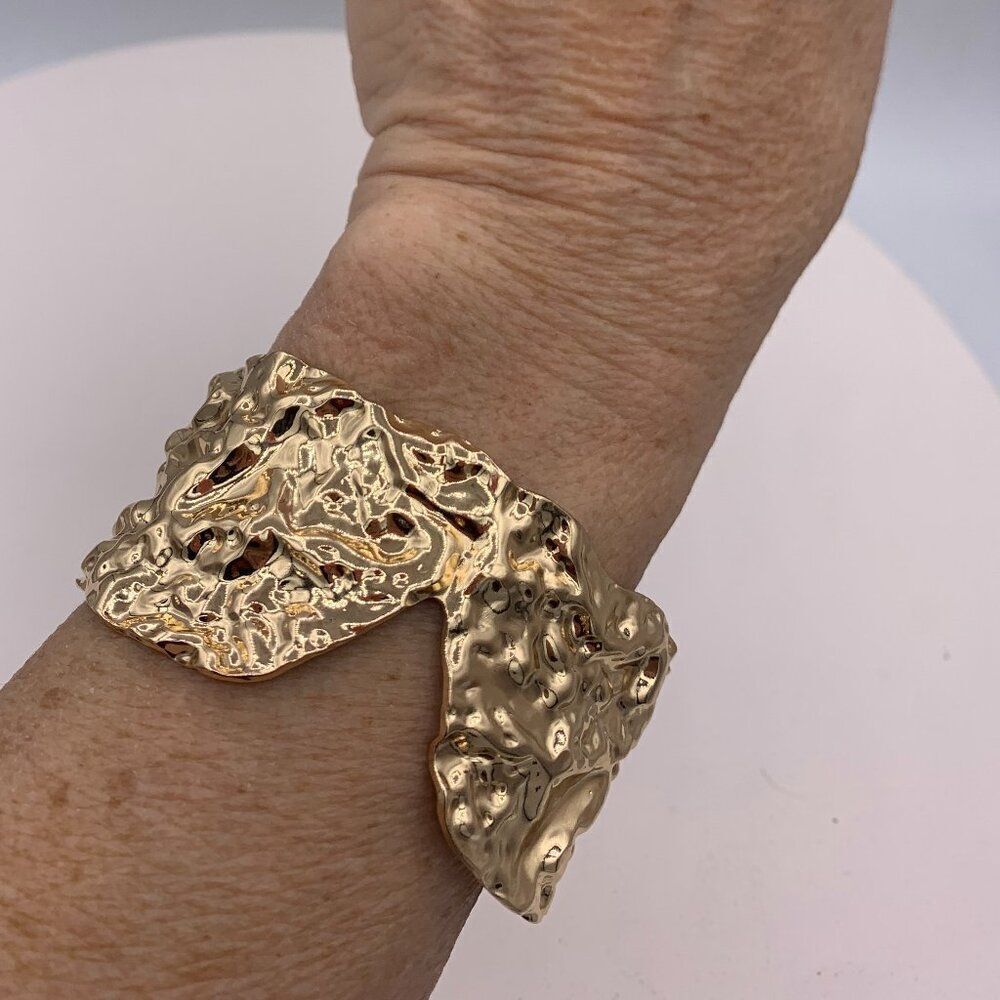 Bracelet, cuff, mirror goldโcolour stainless steel, hammered texture, large
